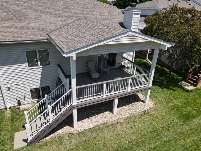AZEK Deck w/ Westbury Railing, and new roof addition.
