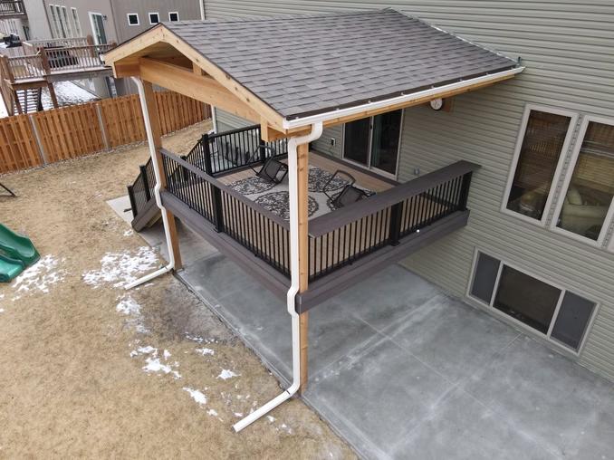 AZEK Deck with custom bar top and roof addition. Cedar ceiling and trim.