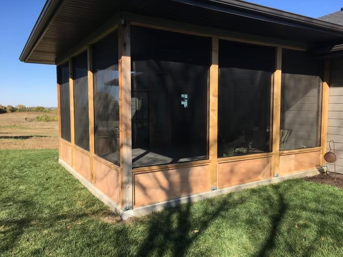 Screened-in porch with cedar trim